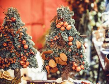 two small decorative christmas trees
