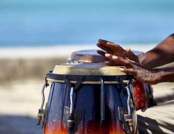 drummer on the beach in hawaii
