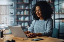 Woman sitting at computer