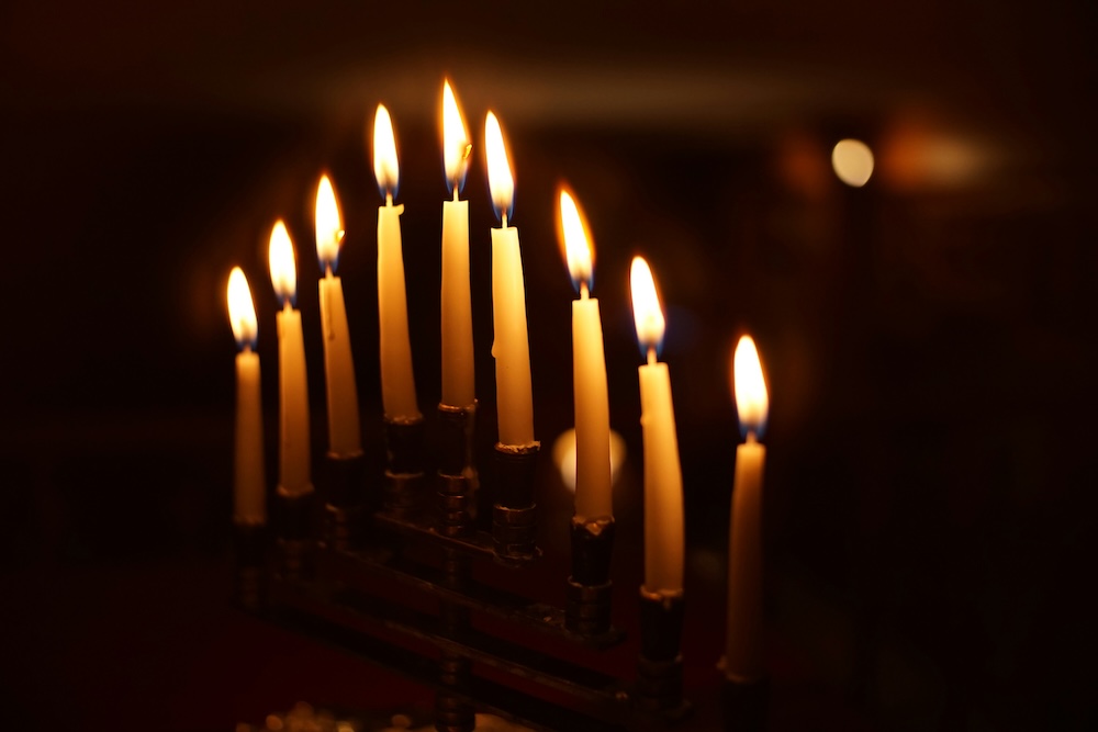 Menorah with lit candles